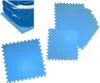 Several blue interlocking foam mats are shown, with a portion of a blue inflatable pool in the upper left corner resting on some of the mats. Produktbild-Vorschau