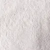 A close-up view of a white terry cloth fabric. Produktbild-Vorschau