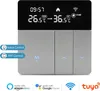 A smart thermostat with a digital display and touch-sensitive buttons, shown against a white background. It displays time, temperature, and icons indicating heating and Wi-Fi connectivity. Text overlays indicate voice and app control compatibility with Ama Podgląd zdjęcia produktu