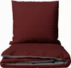 A folded duvet and pillow in bordeaux and anthracite colors, presented on a white background. Produktbild-Vorschau