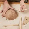 Hands working with clay on a mat. Produktbild-Vorschau