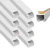 A collection of white cable raceways arranged diagonally on a white background, with one raceway shown in detail with adhesive tape. Produktbild-Vorschau