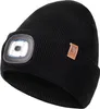 A black knitted beanie with an integrated LED light and a small leather brand tag. Produktbild-Vorschau