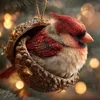 A close-up of a decorative bird ornament made to look like it's nestled in an acorn, hanging on a Christmas tree with bokeh lights in the background. Produktbild-Vorschau