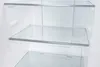 Empty interior of a refrigerator with glass shelves. Produktbild-Vorschau