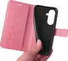 A hand holding a pink flip phone case, showing the inside. Produktbild-Vorschau