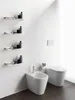 A modern bathroom with a bidet and toilet. Produktbild-Vorschau