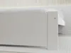 A close-up view of the side of a white bed frame. Náhled obrázku produktu
