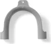 A gray plastic drain hose holder for a washing machine or dishwasher. Produktbild-Vorschau