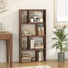 A bookshelf filled with decorative items and books, placed next to a desk and a plant. Podgląd zdjęcia produktu