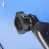 A close-up view of a black knob and part of a black mechanical arm against a blue background. Produktbild-Vorschau