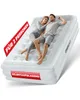 A couple is lying on an inflatable mattress. Produktbild-Vorschau