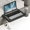 A laptop and accessories are placed on a bed tray next to a bed. Produktbild-Vorschau