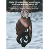A hand wearing a smartwatch is holding a diving mask underwater. Produktbild-Vorschau