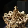 A close-up of a wooden carousel model. Anteprima dell’immagine prodotto
