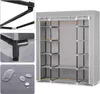 A gray fabric wardrobe with multiple shelves and a hanging rod, shown with close-up details of its construction and material. Produktbild-Vorschau