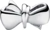 A close-up studio shot of a silver Pandora charm shaped like a bow. Podgląd zdjęcia produktu