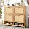 A wooden shoe cabinet with four rattan doors and open storage shelves is shown in a hallway setting. Náhľad obrázku produktu