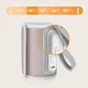 A close-up of a portable baby bottle warmer with a digital display showing the temperature. Produktbild-Vorschau