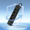 A black power strip with multiple outlets and USB ports is displayed on a pedestal, with a shield and arrow graphic behind it. Anteprima dell’immagine prodotto