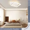 A modern bedroom with a bed, nightstand, and a ceiling light. Produktbild-Vorschau
