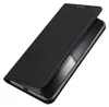 A black flip case for a smartphone is shown from a diagonal angle against a white background. Náhľad obrázku produktu