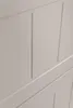 A close-up view of a beige cabinet door with paneling details. Náhľad obrázku produktu