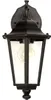 A black outdoor wall lantern with a clear glass enclosure and a visible light bulb. Podgląd zdjęcia produktu