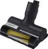 A close-up, studio shot of a black handheld vacuum cleaner attachment with a yellow brush roll. Produktbild-Vorschau