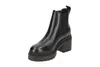 A black leather Chelsea boot with a chunky heel and sole, presented against a white background. Produktbild-Vorschau