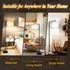 A collage of three scenes showing a floor lamp in a bedroom, living room, and study room. Voir les images du produit