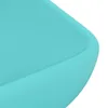 A close-up view of the corner of a light green ceramic sink. Podgląd zdjęcia produktu