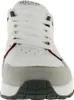 A close-up, front-facing view of a white Skechers sneaker. Voir les images du produit