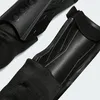 Close-up view of black shin guards. Produktbild-Vorschau