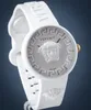 A white Versace watch with a Medusa head on the dial, set against a dark blue background. Náhled obrázku produktu