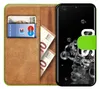 A book-style phone case for a Samsung Galaxy S20 Ultra, showing the inside with cards and banknotes, and the phone screen with a decorative overlay. Produktbild-Vorschau