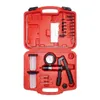 A red plastic case containing a vacuum pump kit with various accessories, laid out for display. Produktbild-Vorschau