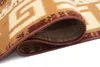 A close-up view of a rolled-up rug, showing the texture and pattern of the material. Anteprima dell’immagine prodotto