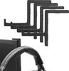 Four black headset holders are arranged in a staggered pattern above a black monitor and a black headset. Produktbild-Vorschau