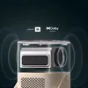 A close-up view of a projector with sound wave graphics emanating from it, highlighting audio features. Produktbild-Vorschau