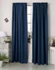 A room interior with a window covered by dark blue curtains. Produktbild-Vorschau