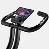Close-up of the handlebars and tablet holder of an exercise bike. Anteprima dell’immagine prodotto