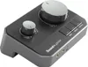 A black and silver audio control device with knobs and buttons. Produktbild-Vorschau