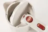A close-up view of the lid and handle of a white electric kettle with red buttons. Produktbild-Vorschau