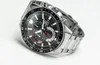 A close-up studio shot of a Casio Edifice chronograph watch with a black dial and stainless steel bracelet, set against a white background. Voir les images du produit