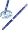 A blue erasable pen with blue ink scribbled around it, shown against a white background. Náhľad obrázku produktu