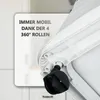 A close-up view of a white rolling cabinet's wheel and base, with German text overlay. Produktbild-Vorschau