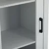 A close-up view of a white cabinet with a black handle. Náhľad obrázku produktu