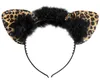 Haarband met luipaardoren, versierd met strass en veren Productafbeelding-voorbeeld 1