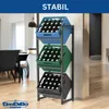 A three-tiered metal rack holding colored crates filled with bottles, placed in a modern interior setting. Produktbild-Vorschau